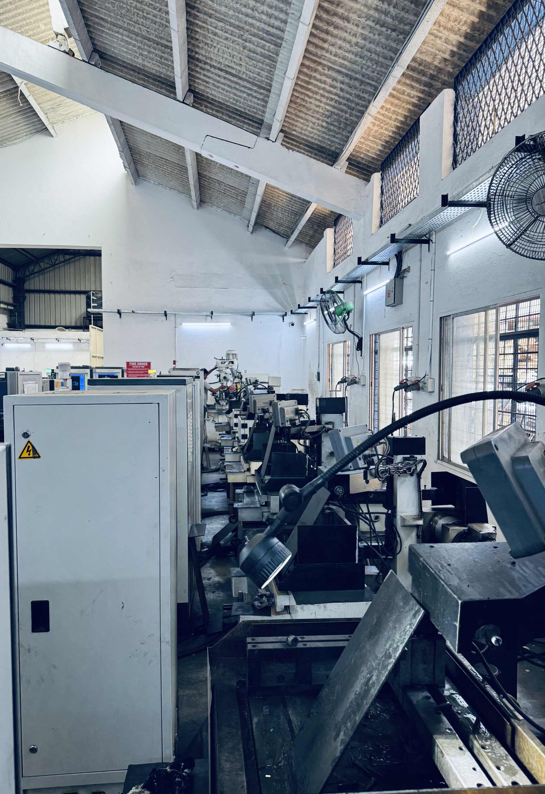 Precision CNC machining floor at Concord United Products Private Limited manufacturing industrial pelletizer blades, underwater pelletizing dies, and wear parts for plastic compounding, black masterbatch processing, and recycling lines.
